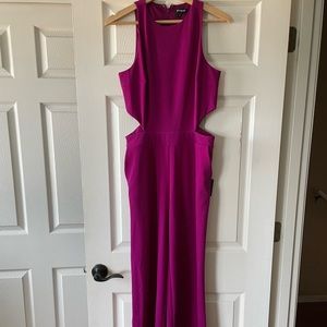 Express size medium fuschia wide leg jumpsuit with side cutouts
